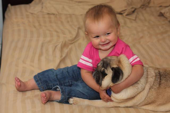 Baby with Vodafone Dogs Very Cute