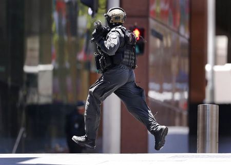 Developing story: At least 10 hostages held inside Sydney cafe
