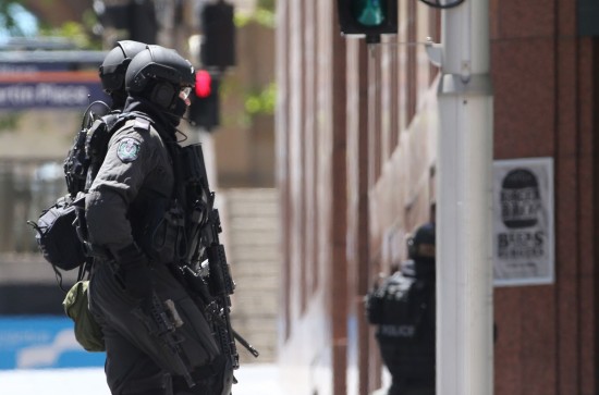 Developing story: At least 10 hostages held inside Sydney cafe